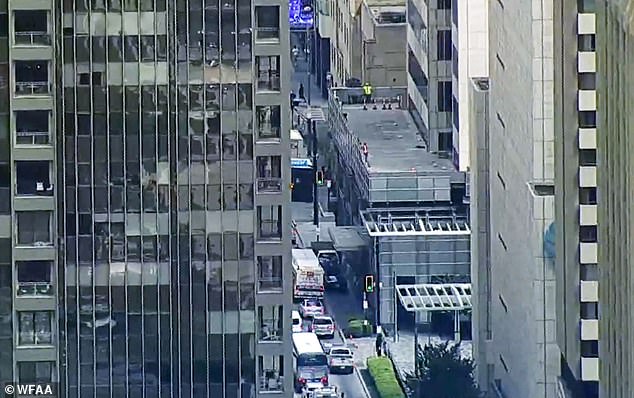 Three People Wounded in Midday Shooting at Commerce Street High-Rise in Dallas as Police Launch Manhunt