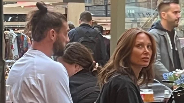 Former Premier League star Andy Carroll sparks romance rumors with Lou Teasdale as they are seen together in Spitalfields following his separation from Billi Mucklow