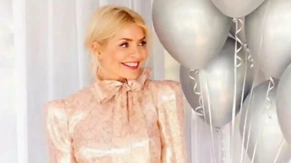 Holly Willoughby shrugs off Phillip Schofield’s latest swipe by posing in a pink dress and sharing heartfelt messages with fans in celebration of her wellness brand Wylde Moon