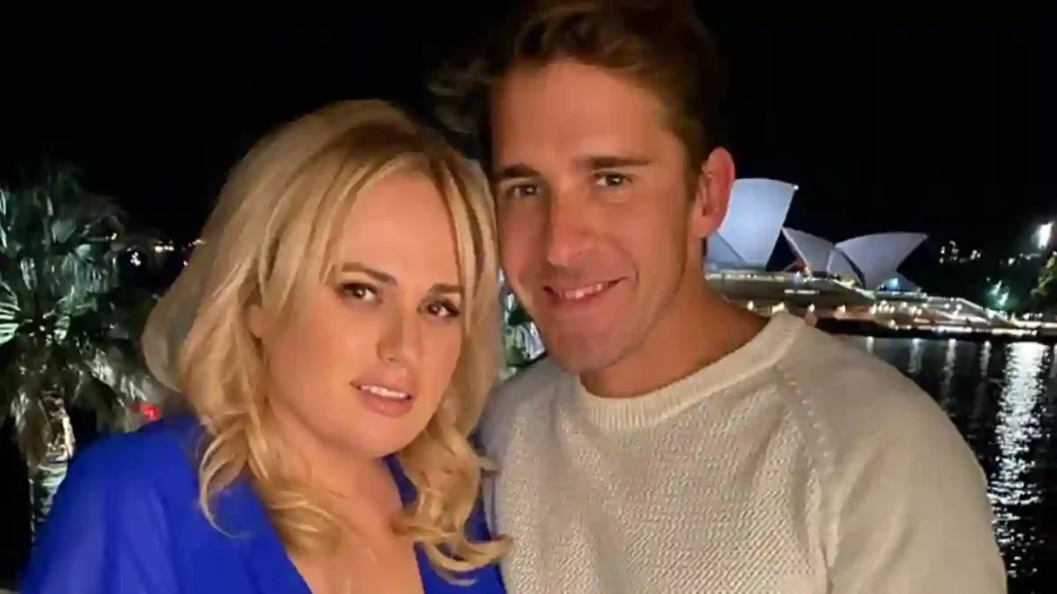 Former friend Hugh Sheridan reacts to Rebel Wilson’s lavish Sardinia wedding to Ramona Agruma after being left off the guest list