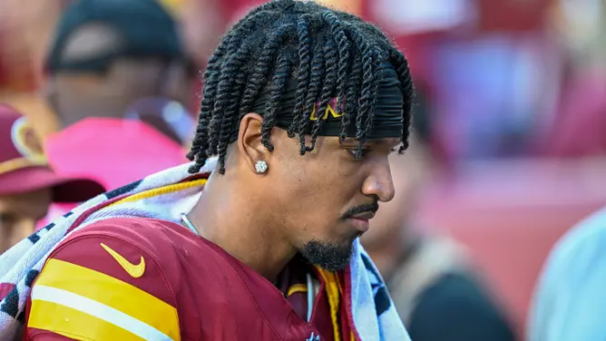 Washington Commanders Rookie Quarterback Jayden Daniels Leaves Game with Rib Injury After Dramatic Tackle Against Carolina Panthers