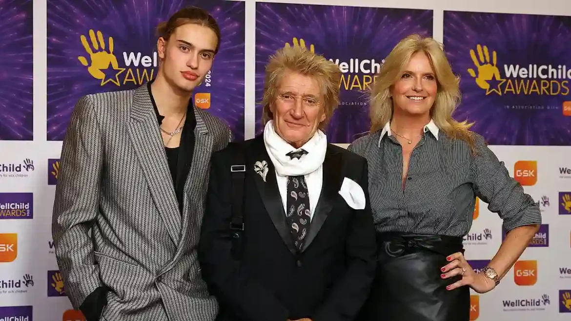 Sir Rod Stewart, Penny Lancaster, and their son Alistair make a stylish appearance at the WellChild Awards in London while dispelling marriage rumors