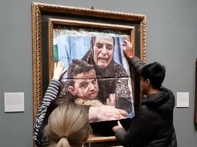 Youth Demand Activists Cover Picasso Painting with Gaza Mother and Child Image at the National Gallery in London to Protest Ongoing Violence