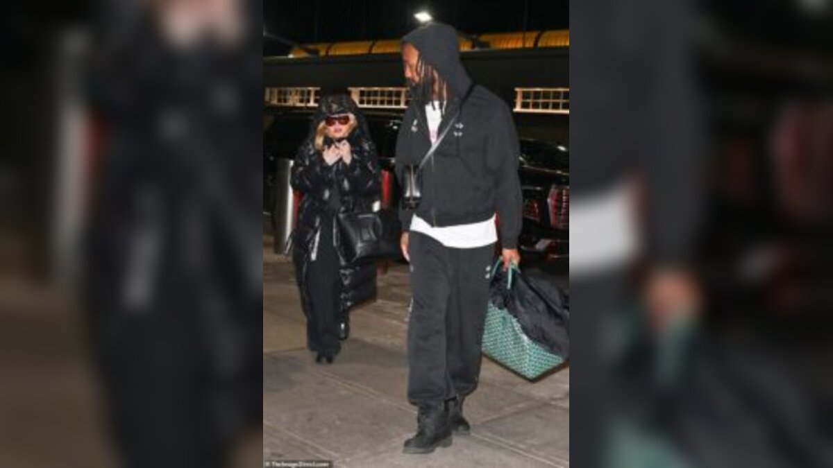 Madonna Sparks Frenzy in New York as 30-Year-Old Akeem Morris Wraps His Arm Around Her at JFK Airport